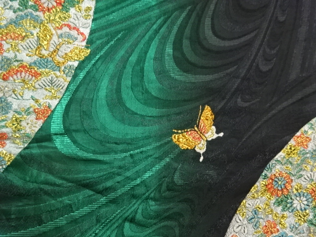  曲線に蝶・草花模様織出し袋帯